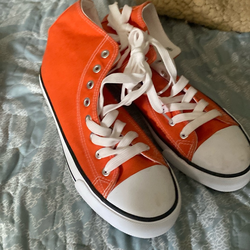 Orange high top sneakers